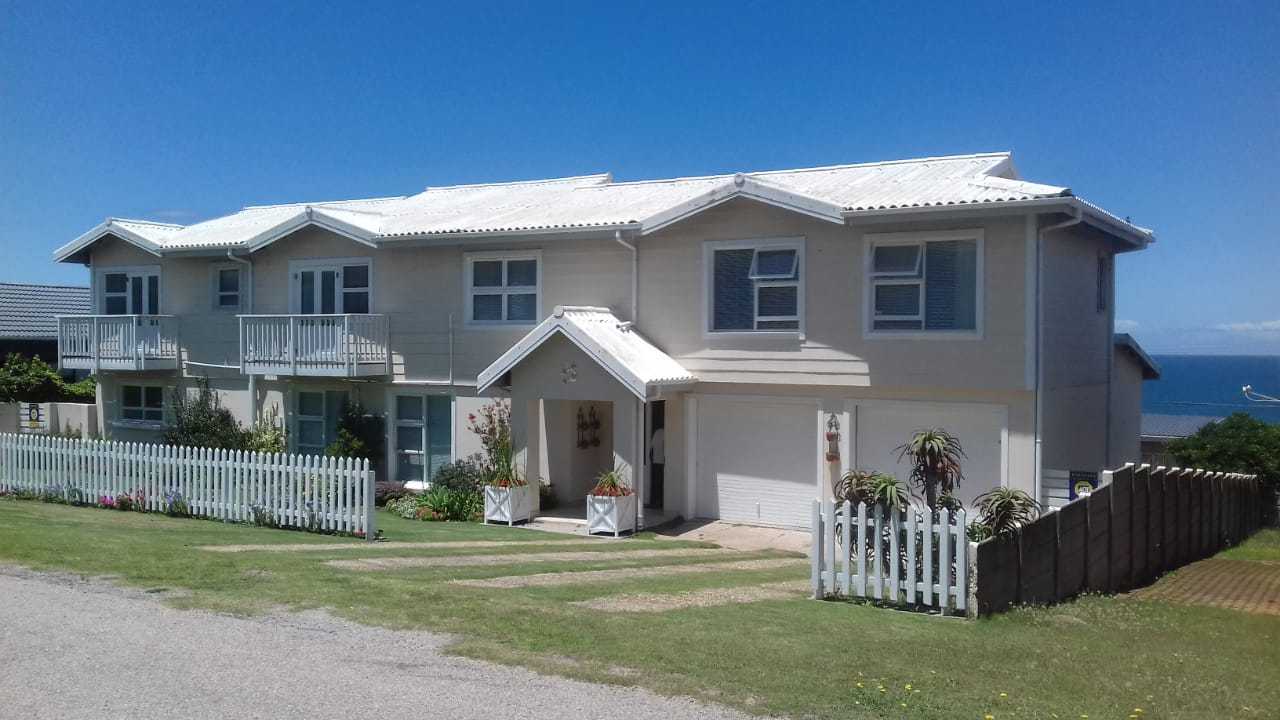Julsie's Home in Reebok with the sea in the background